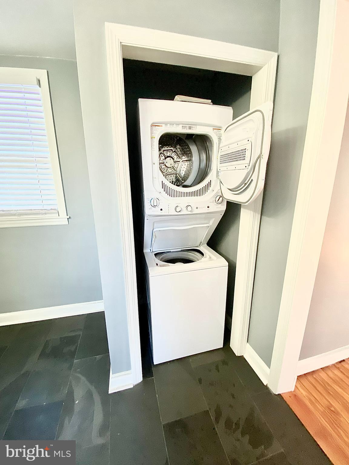 67 Main Street, Unit A Mantua, NJ 08051 - Photo 9 of 13 a utility room with dryer and washer