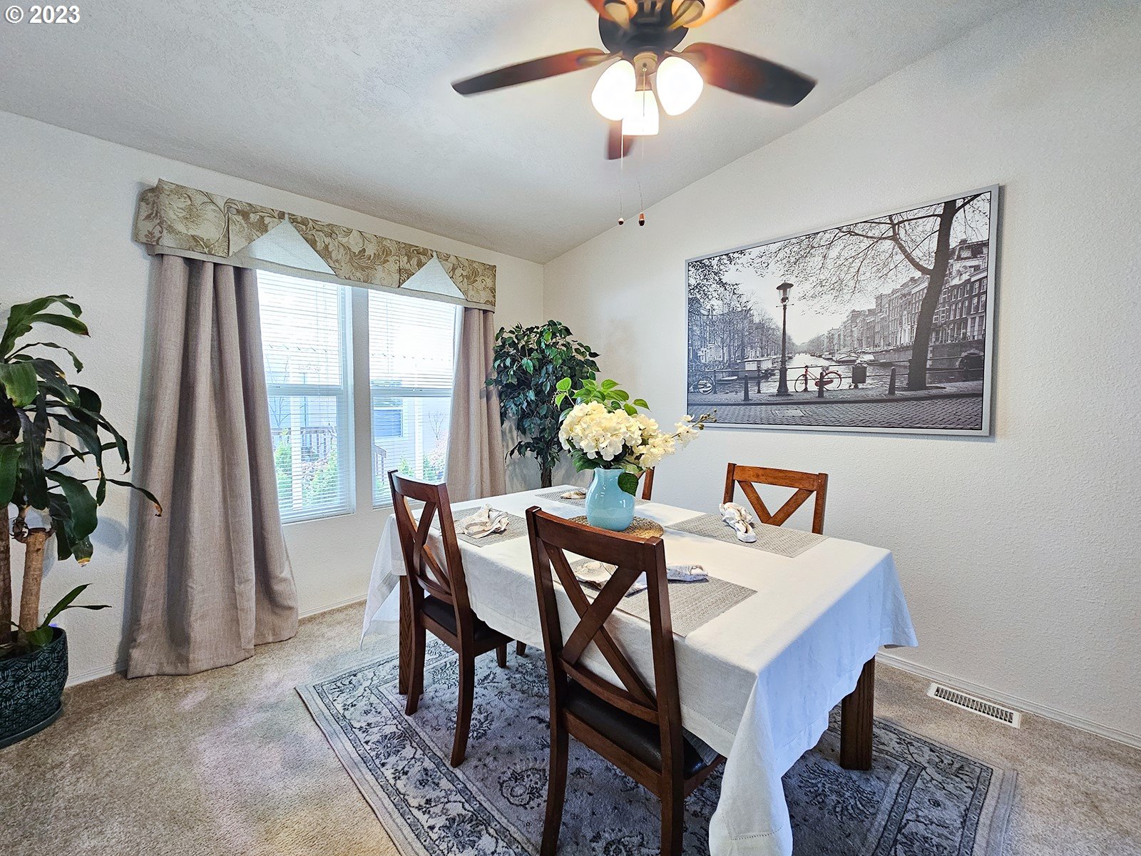 12450 Southwest Fischer Road, Unit 142 Tigard, OR 97224 - Photo 15 of 35 a view of a dining room with furniture window and outside view