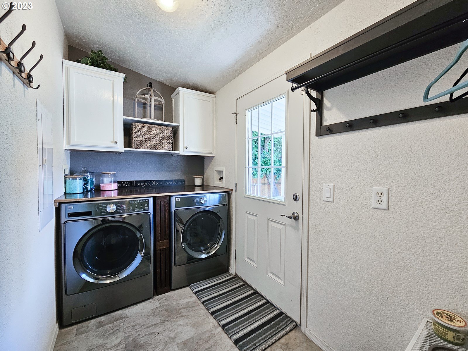 12450 Southwest Fischer Road, Unit 142 Tigard, OR 97224 - Photo 20 of 35 a utility room with dryer and washer