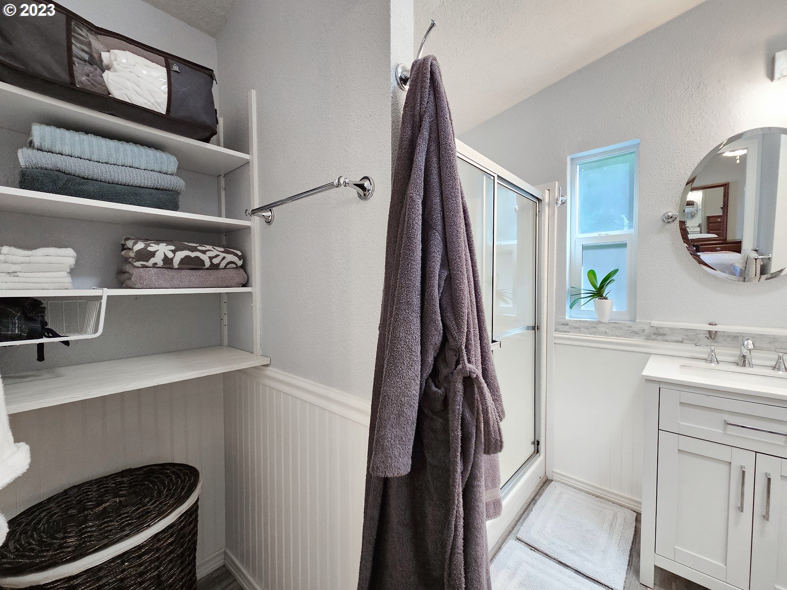 12450 Southwest Fischer Road, Unit 142 Tigard, OR 97224 - Photo 27 of 35 a view of walk in closet with clothes and shoes