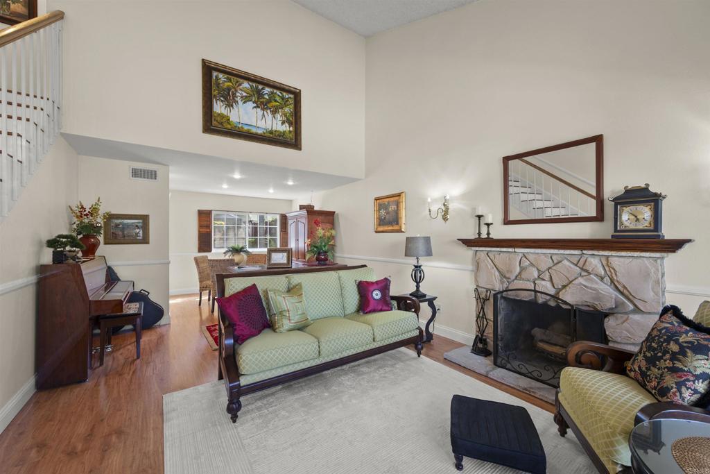 4627 Huggins Street University City, CA 92122 - Photo 11 of 54 a living room with furniture and a fireplace