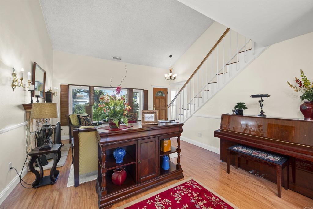 4627 Huggins Street University City, CA 92122 - Photo 12 of 54 a living room with furniture and a fireplace