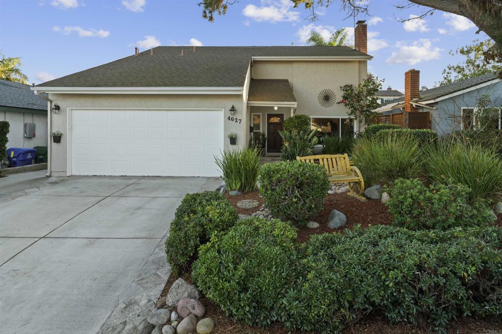 4627 Huggins Street University City, CA 92122 - Photo 2 of 54 front view of a house with potted plants