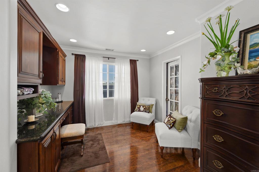 4627 Huggins Street University City, CA 92122 - Photo 25 of 54 a living room with furniture and a fireplace