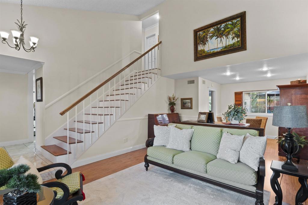 4627 Huggins Street University City, CA 92122 - Photo 30 of 54 a living room with furniture and wooden floor