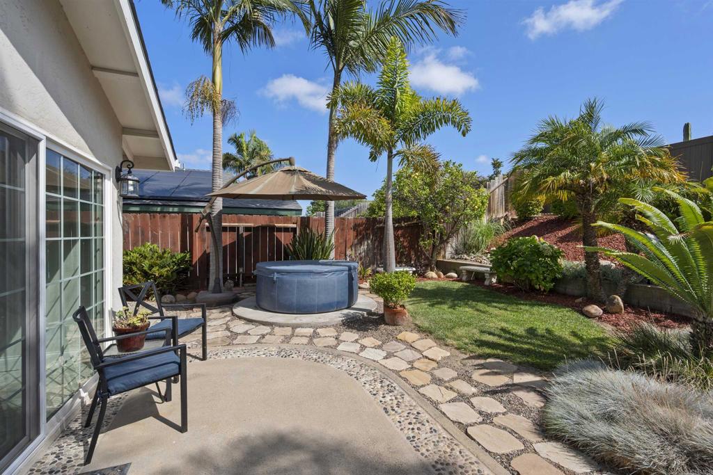 4627 Huggins Street University City, CA 92122 - Photo 32 of 54 a view of a chair and table in backyard of the house