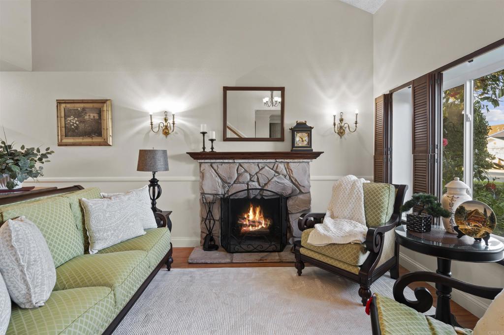 4627 Huggins Street University City, CA 92122 - Photo 44 of 54 a living room with furniture and a fireplace