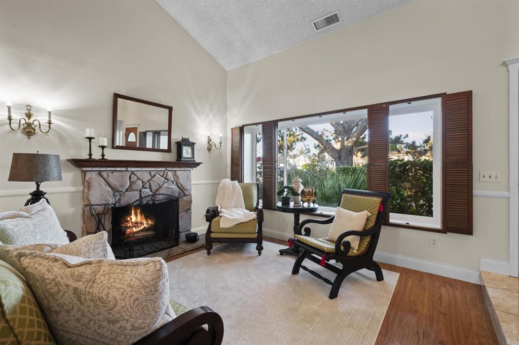 4627 Huggins Street University City, CA 92122 - Photo 45 of 54 a living room with furniture and a fireplace