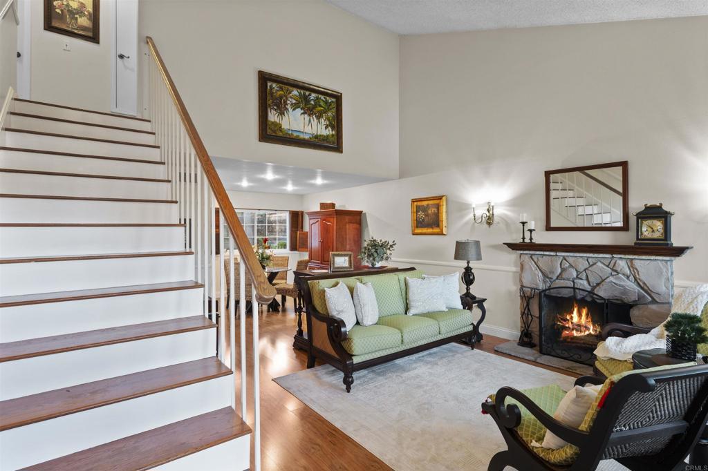 4627 Huggins Street University City, CA 92122 - Photo 47 of 54 a living room with furniture and a fireplace