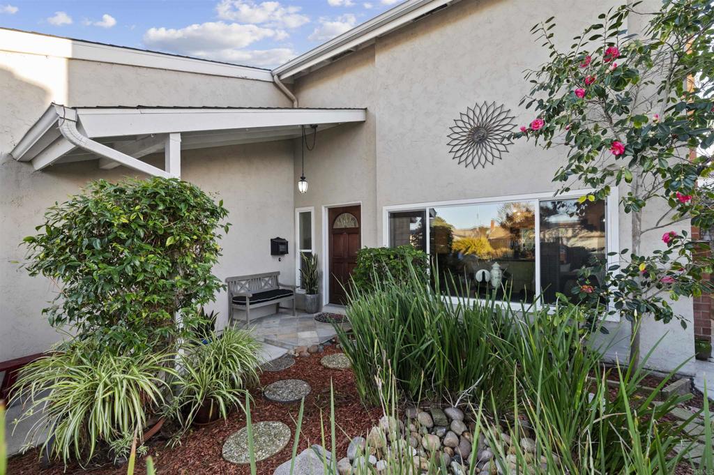 4627 Huggins Street University City, CA 92122 - Photo 50 of 54 a flower plants in front of a house