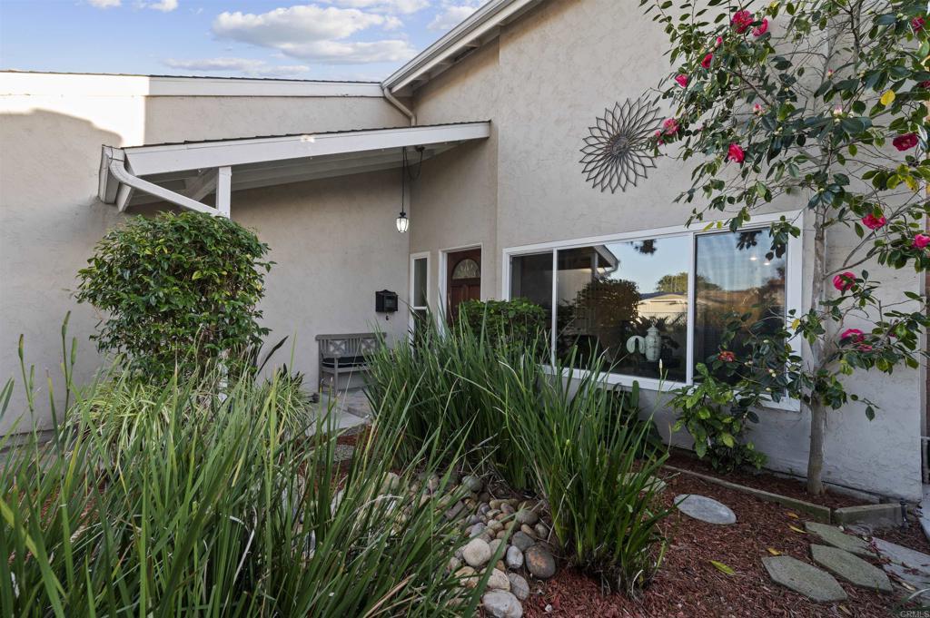 4627 Huggins Street University City, CA 92122 - Photo 51 of 54 a house with a flower garden