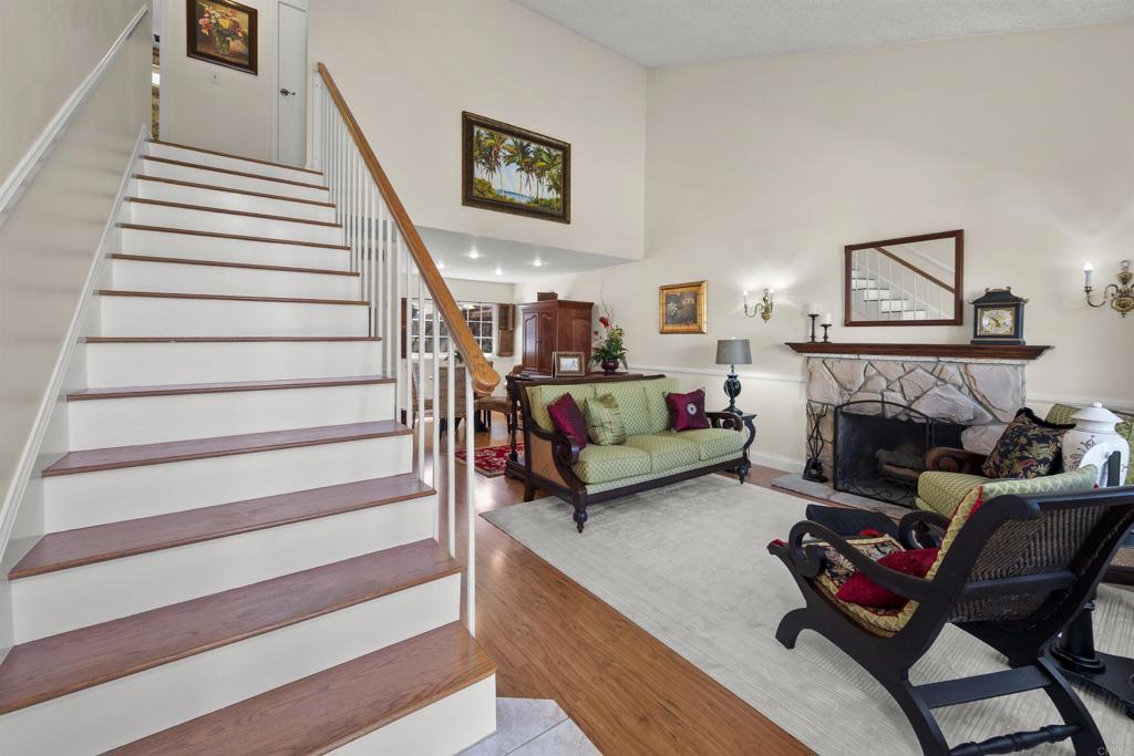 4627 Huggins Street University City, CA 92122 - Photo 8 of 54 a living room with furniture and a fireplace