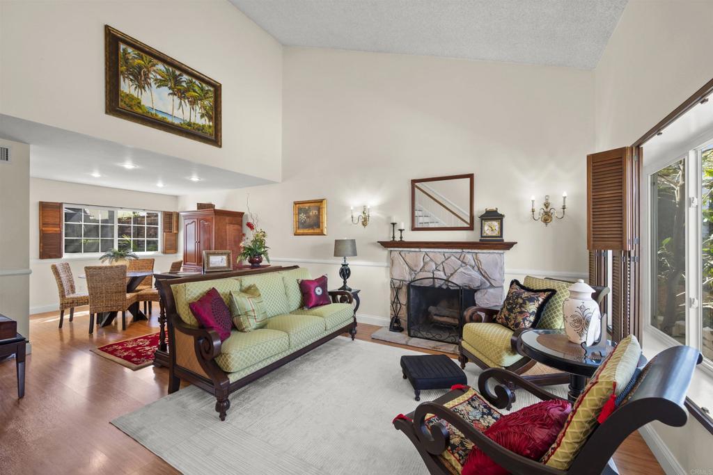 4627 Huggins Street University City, CA 92122 - Photo 9 of 54 a living room with furniture and a fireplace