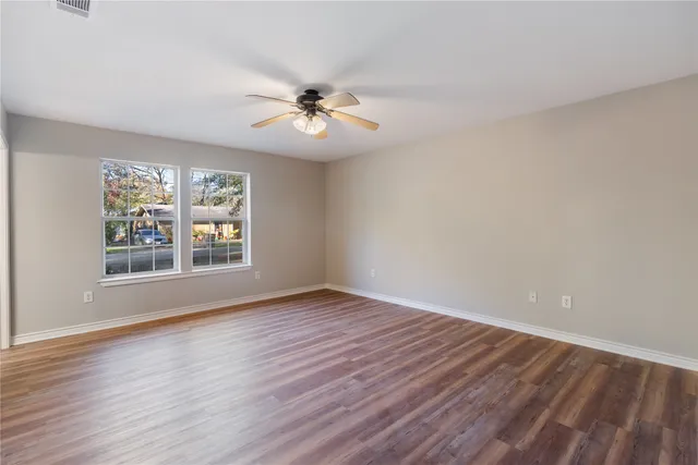 a view of an empty walk in closet