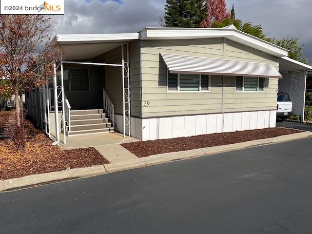 a front view of a house with a garage