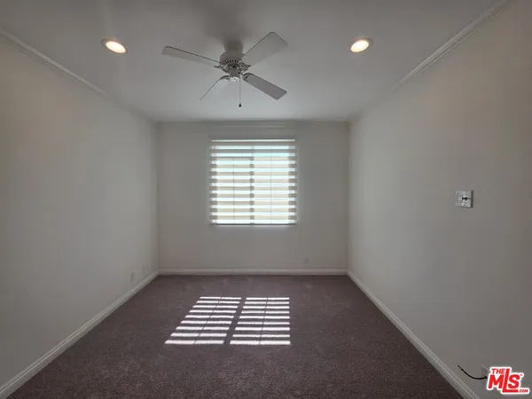 a bathroom with a double vanity sink and mirror