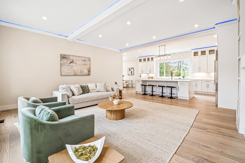 36 Oakmount Circle Lexington, MA 02420 - Photo 17 of 42 a living room with fireplace furniture and a large window
