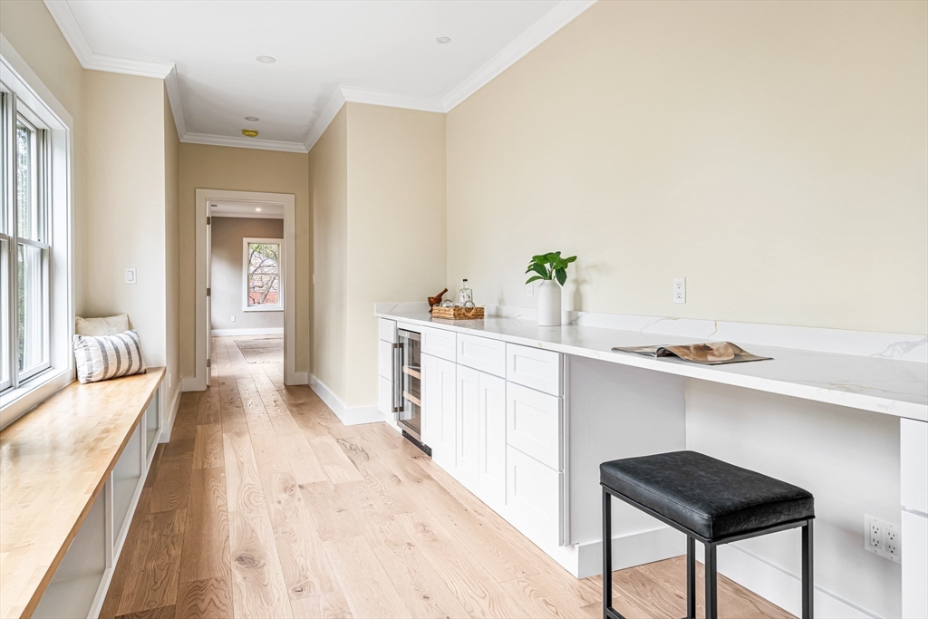 36 Oakmount Circle Lexington, MA 02420 - Photo 24 of 42 a kitchen with a sink and chairs
