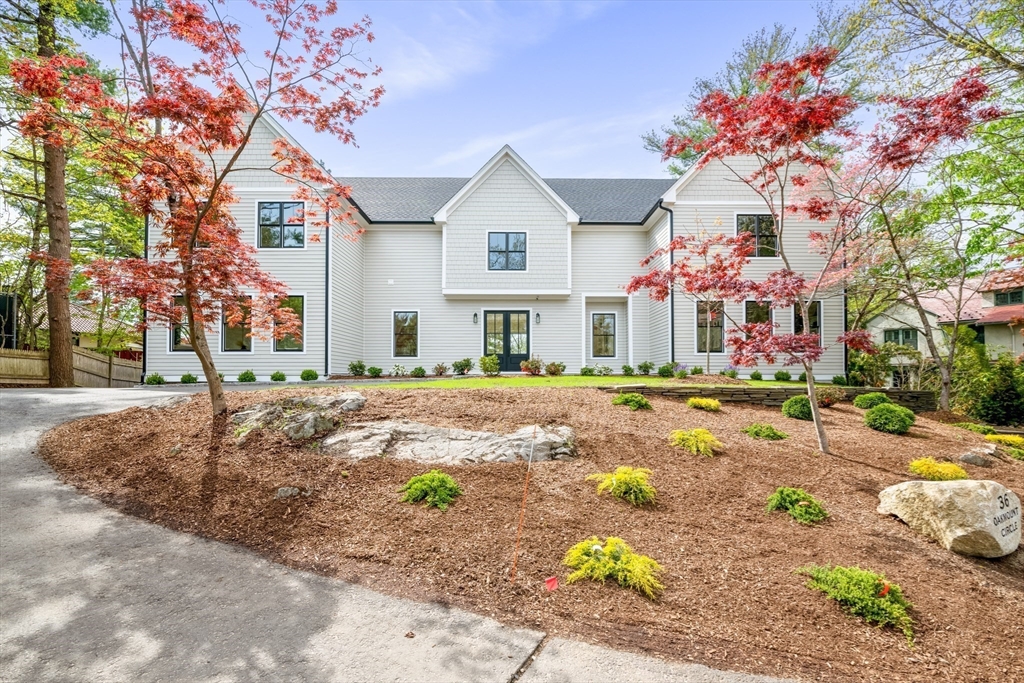 36 Oakmount Circle Lexington, MA 02420 - Photo 3 of 42 a front view of a house with a yard