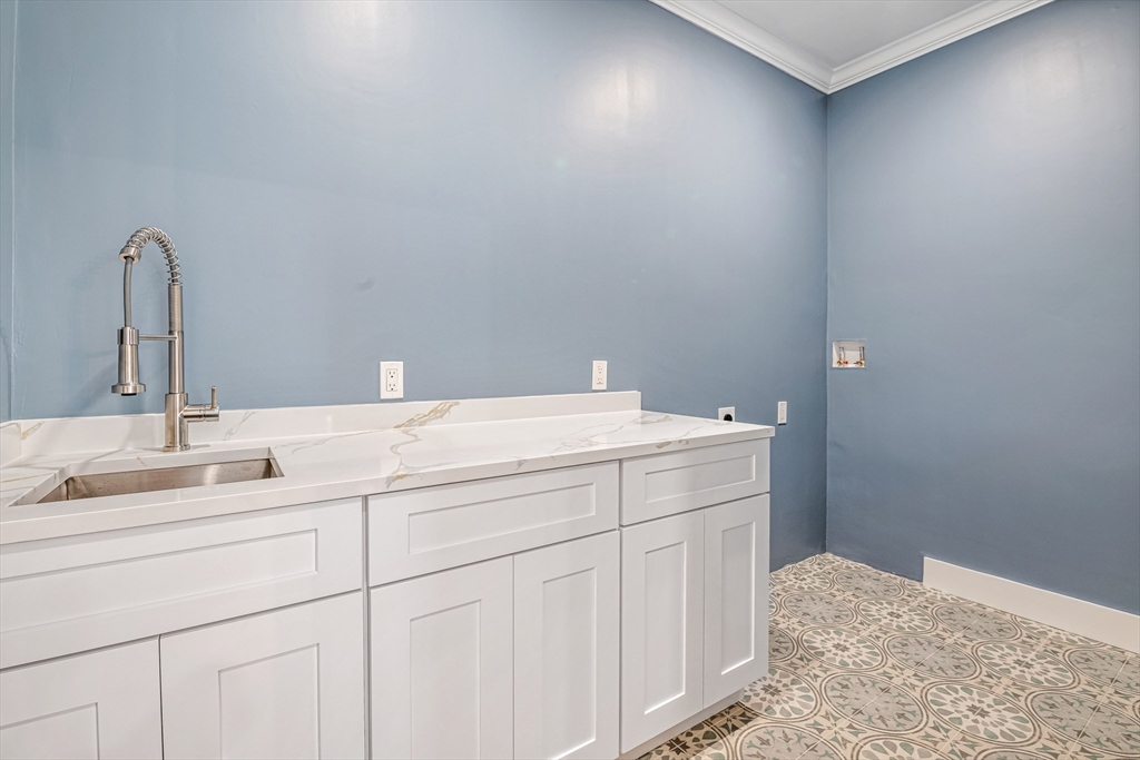 36 Oakmount Circle Lexington, MA 02420 - Photo 32 of 42 a bathroom with a sink and vanity