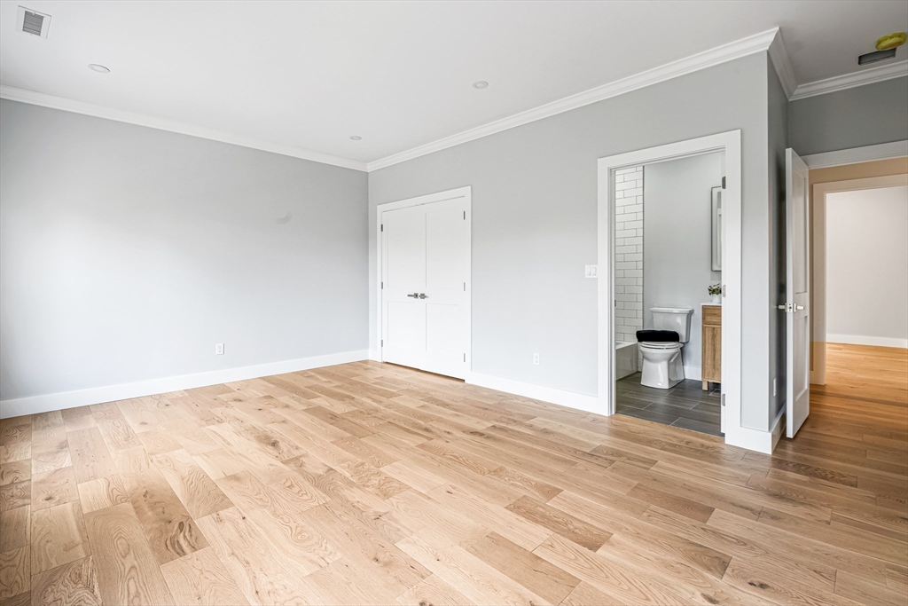 36 Oakmount Circle Lexington, MA 02420 - Photo 35 of 42 a view of empty room with wooden floor