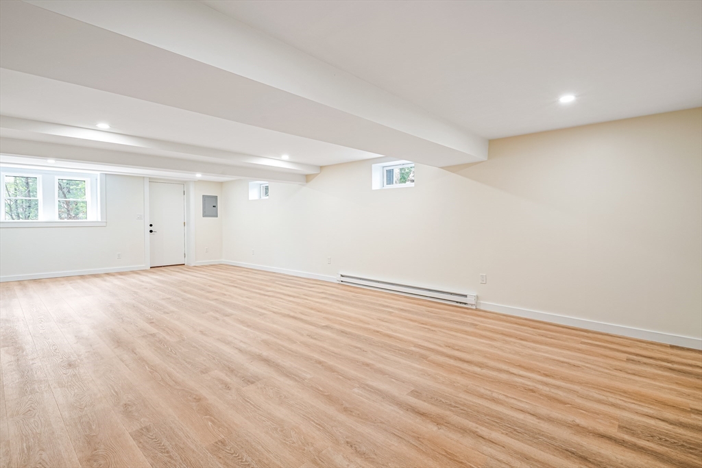 36 Oakmount Circle Lexington, MA 02420 - Photo 38 of 42 a view of empty room with wooden floor
