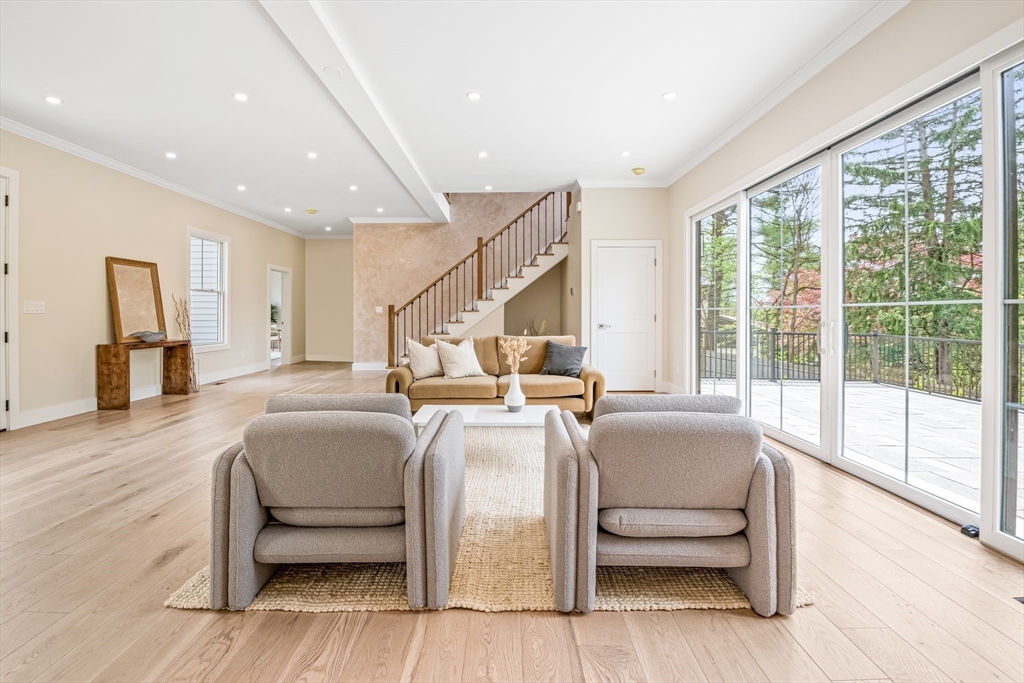 36 Oakmount Circle Lexington, MA 02420 - Photo 7 of 42 a living room with furniture and a large window