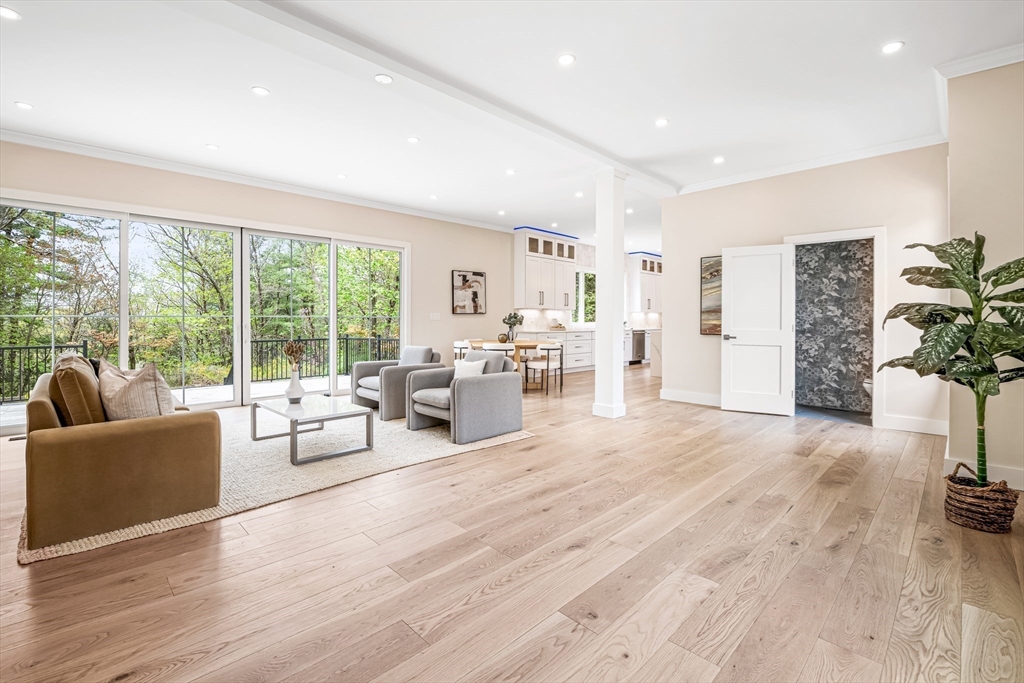 36 Oakmount Circle Lexington, MA 02420 - Photo 8 of 42 a living room with furniture and a floor to ceiling window