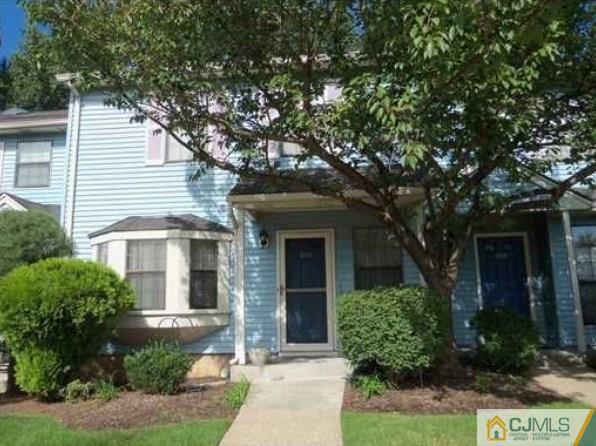 1504 Maplecrest Road Edison, NJ 08820 - Photo 1 of 15 a front view of a house with garden