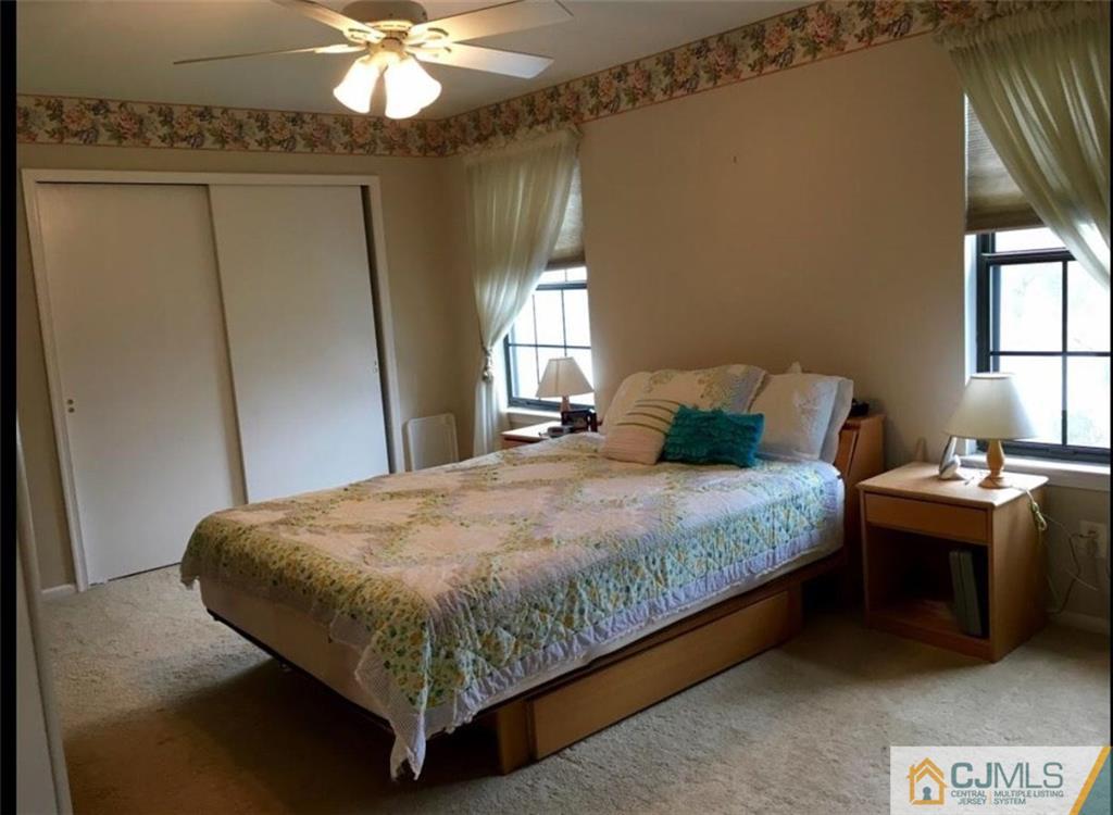 1504 Maplecrest Road Edison, NJ 08820 - Photo 14 of 15 a bedroom with a bed and window