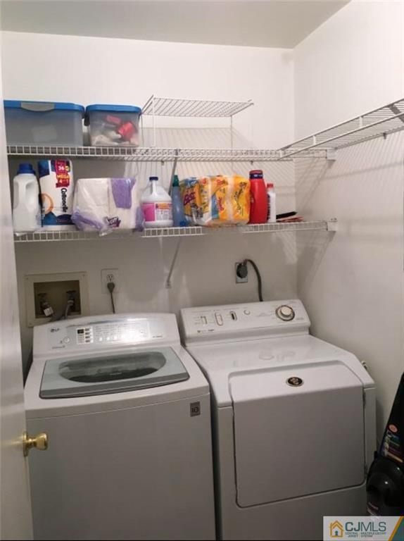 1504 Maplecrest Road Edison, NJ 08820 - Photo 15 of 15 a utility room with dryer and washer