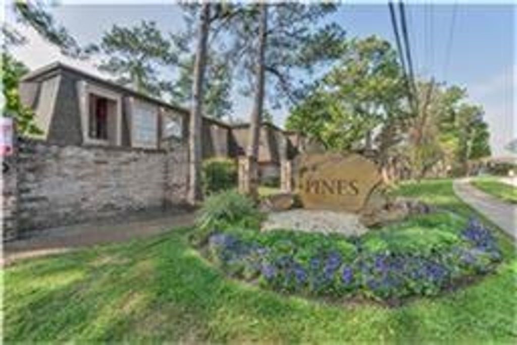 12633 Memorial Drive, Unit 159 Houston, TX 77024 - Photo 15 of 15 a view of a back yard of the house