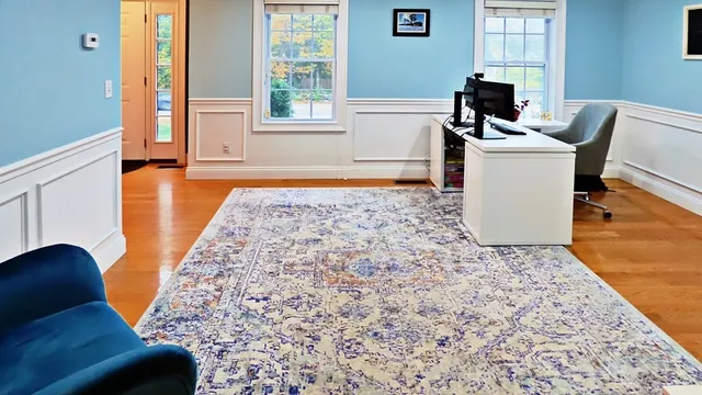 a living room with a couch and a table
