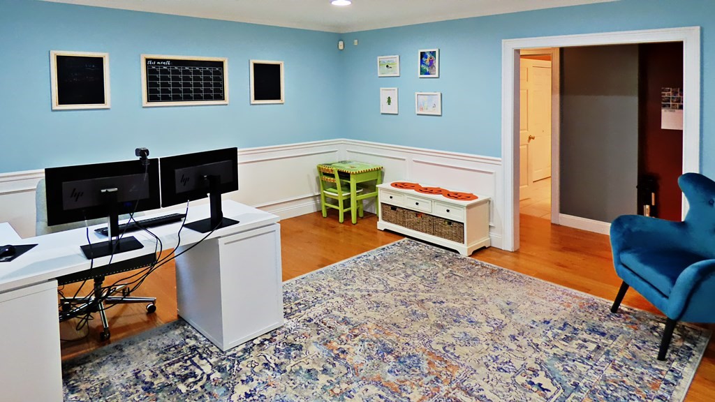255 Holmes Street Hanson, MA 02341 - Photo 17 of 34 a living room with furniture and a flat screen tv