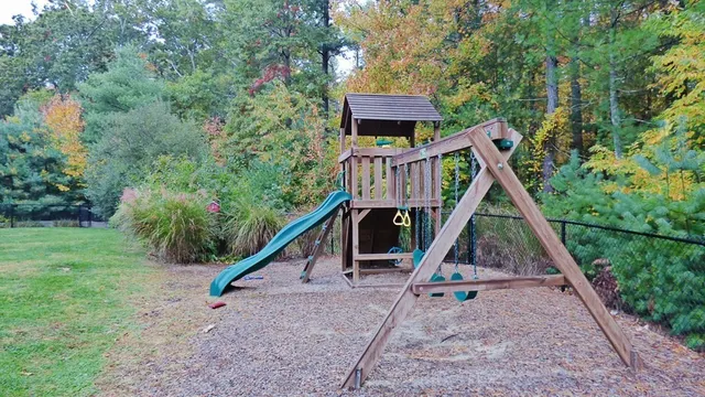 a view of a house with a park