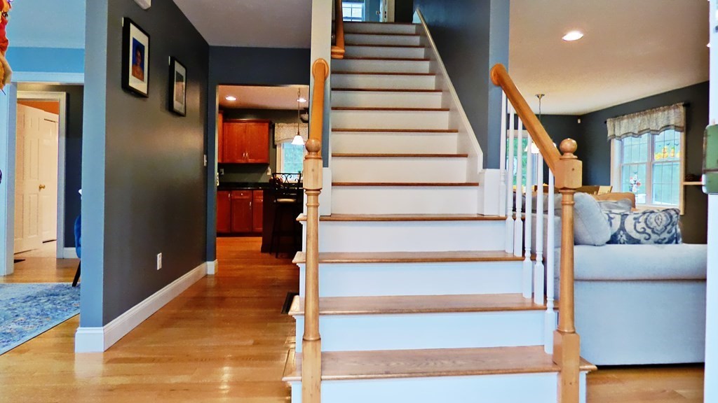 255 Holmes Street Hanson, MA 02341 - Photo 4 of 34 a view of entryway and hall with wooden floor