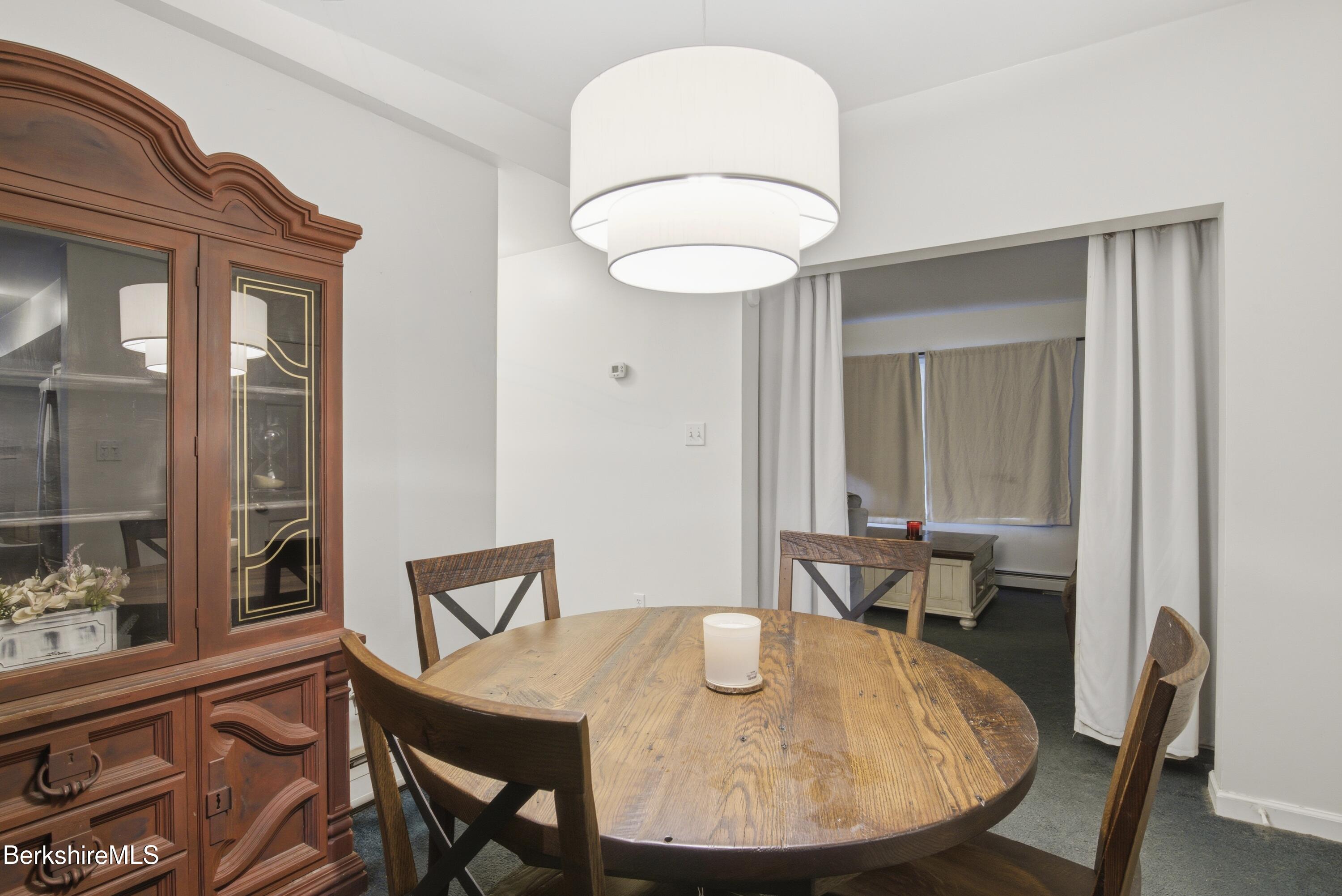 51 Notch Road North Adams, MA 01247 - Photo 12 of 21 a view of a dining room with furniture and wooden floor