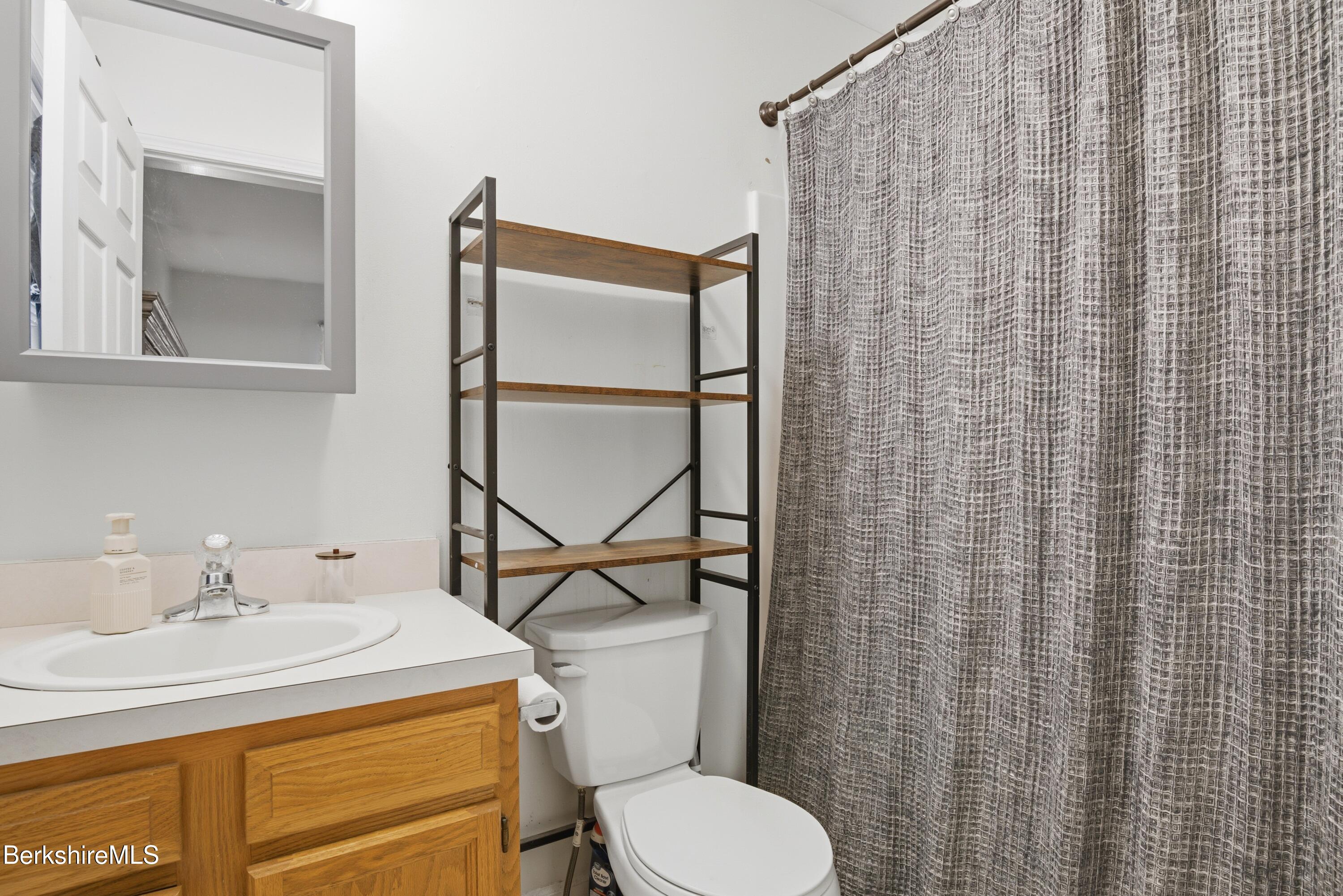 51 Notch Road North Adams, MA 01247 - Photo 18 of 21 a bathroom with a sink toilet and mirror