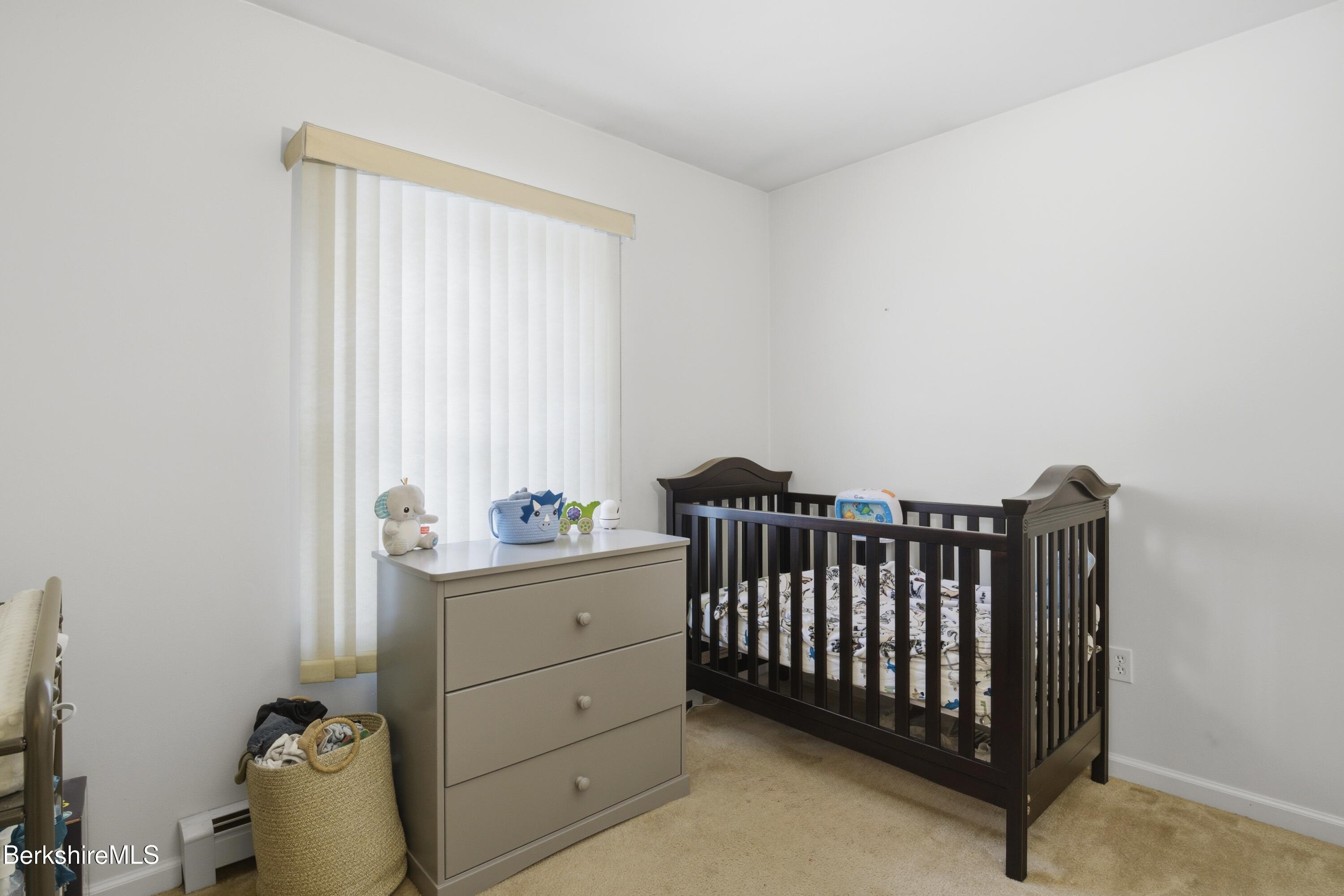 51 Notch Road North Adams, MA 01247 - Photo 19 of 21 a bedroom with a bed and a window
