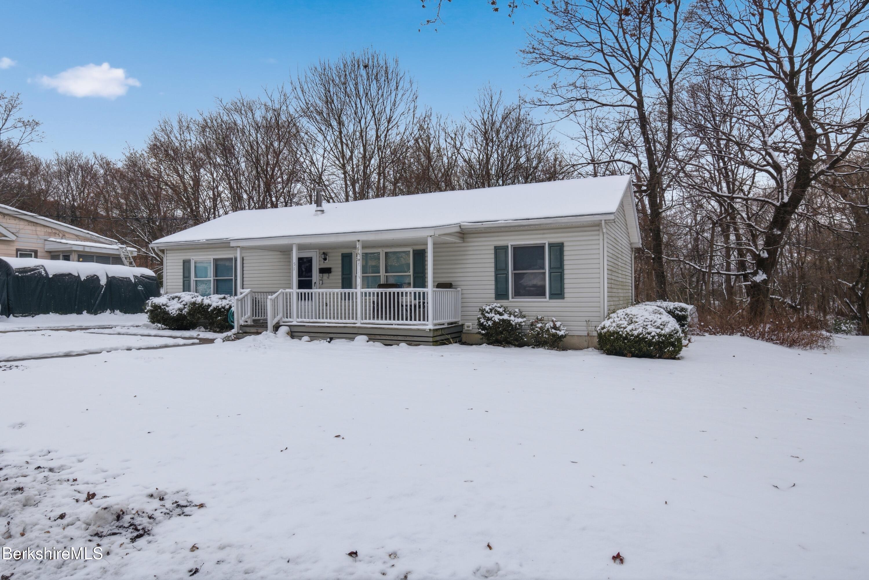 51 Notch Road North Adams, MA 01247 - Photo 2 of 21 a view of a house with a yard and sitting area