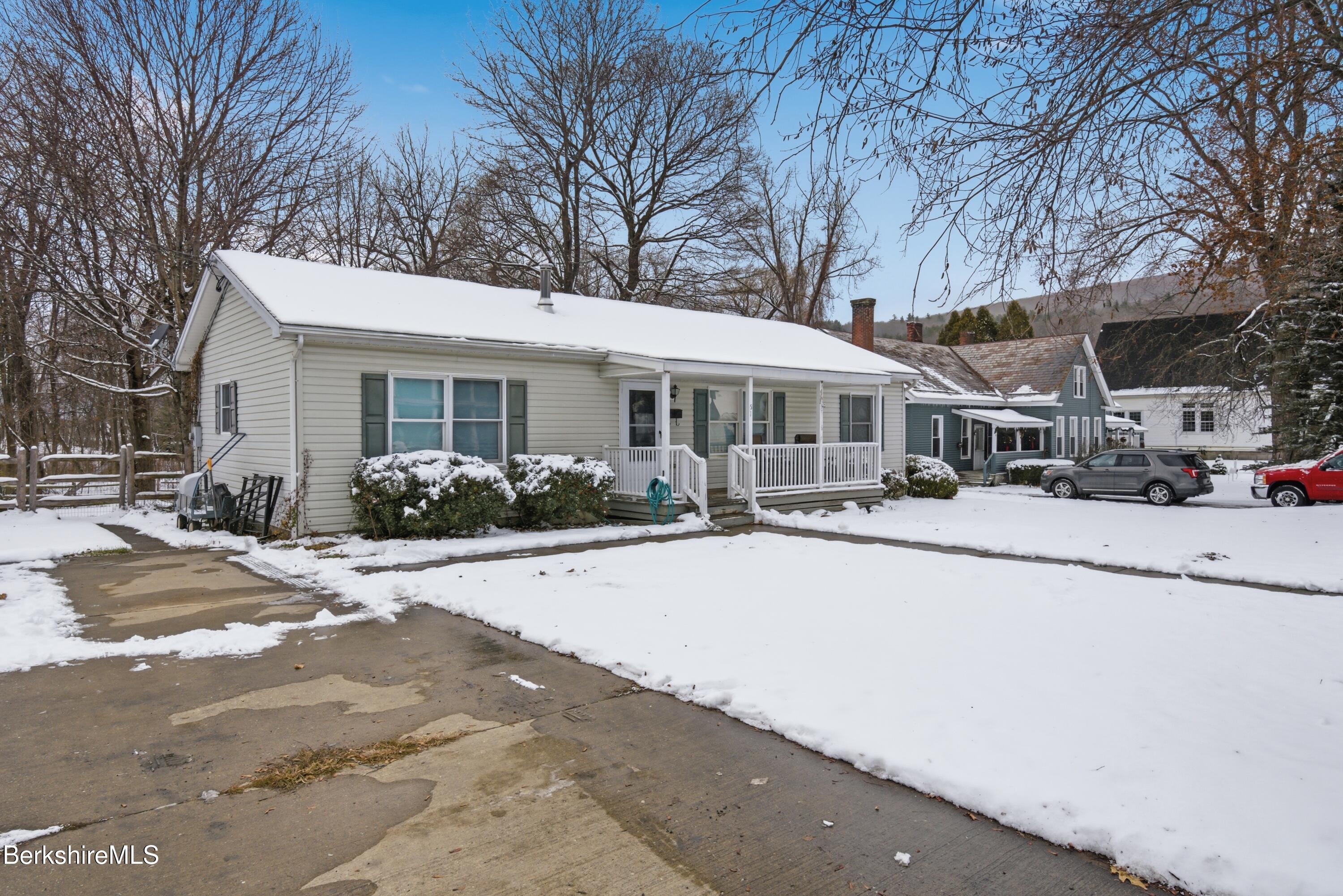 51 Notch Road North Adams, MA 01247 - Photo 3 of 21 a building with trees in front of it
