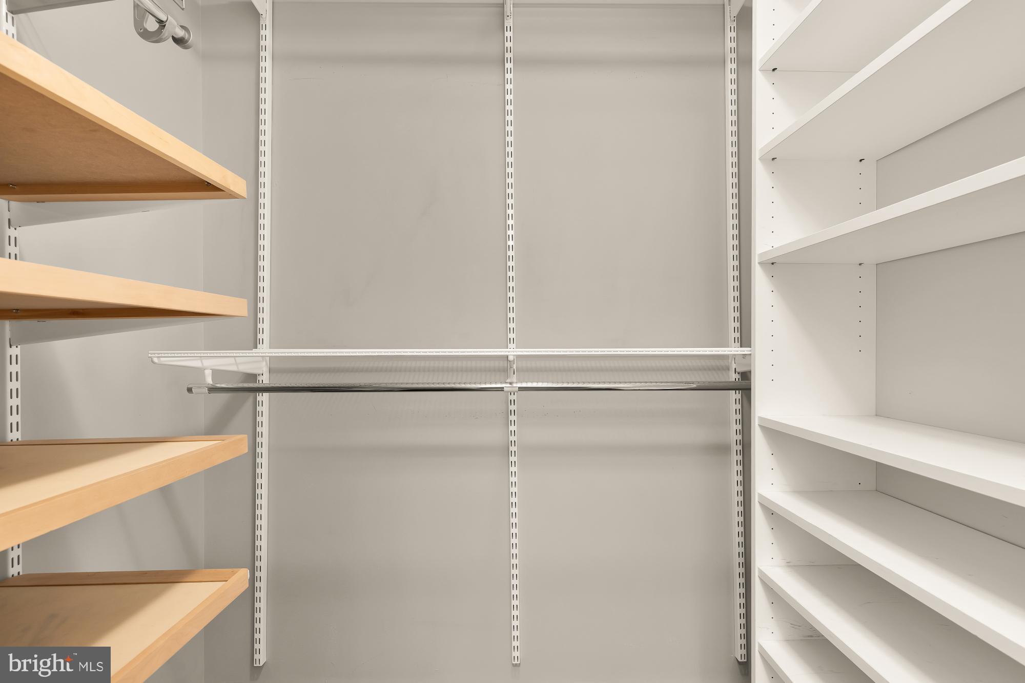 910 M Street Northwest, Unit 804 Washington, DC 20001 - Photo 21 of 32 Spacious closet with organized shelving.