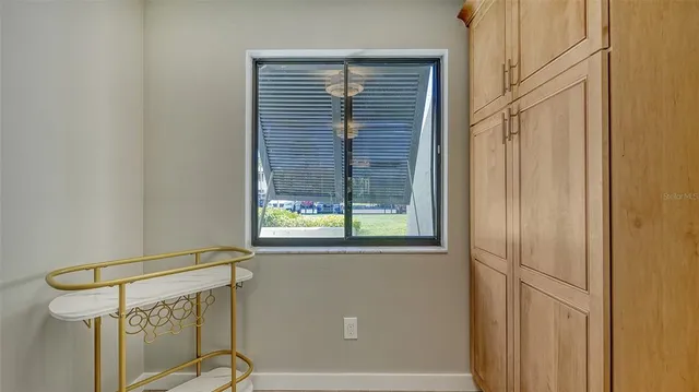 a view of a room that has a window in it