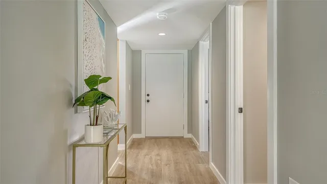 a view of entryway with wooden floor