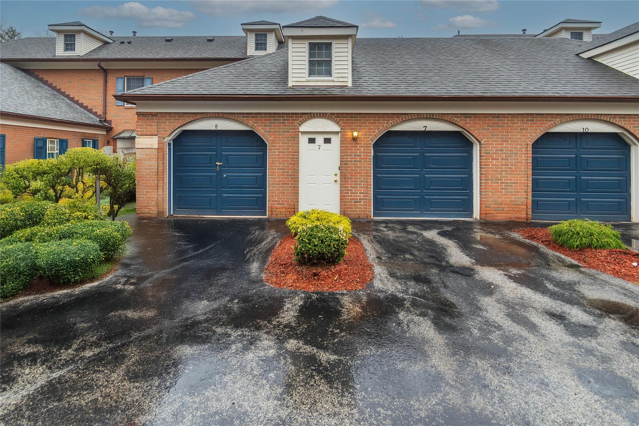 7 Westbrook Road Newburgh, NY 12550 - Photo 1 of 1 View of front facade with brick siding and a one car attached garage.