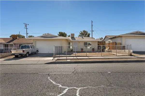 a view of a street in front of house
