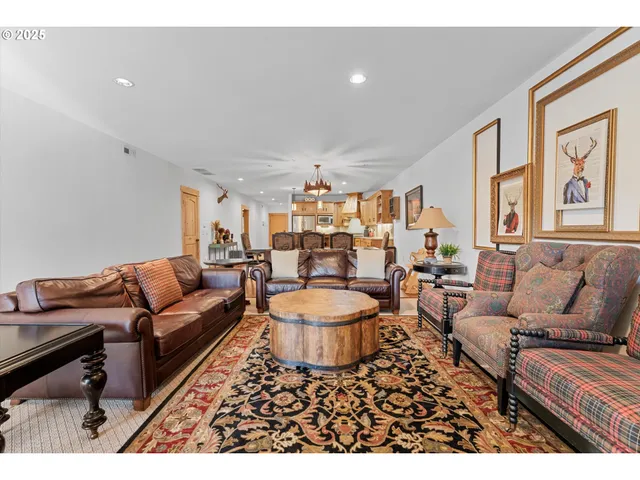 a living room with furniture and a rug