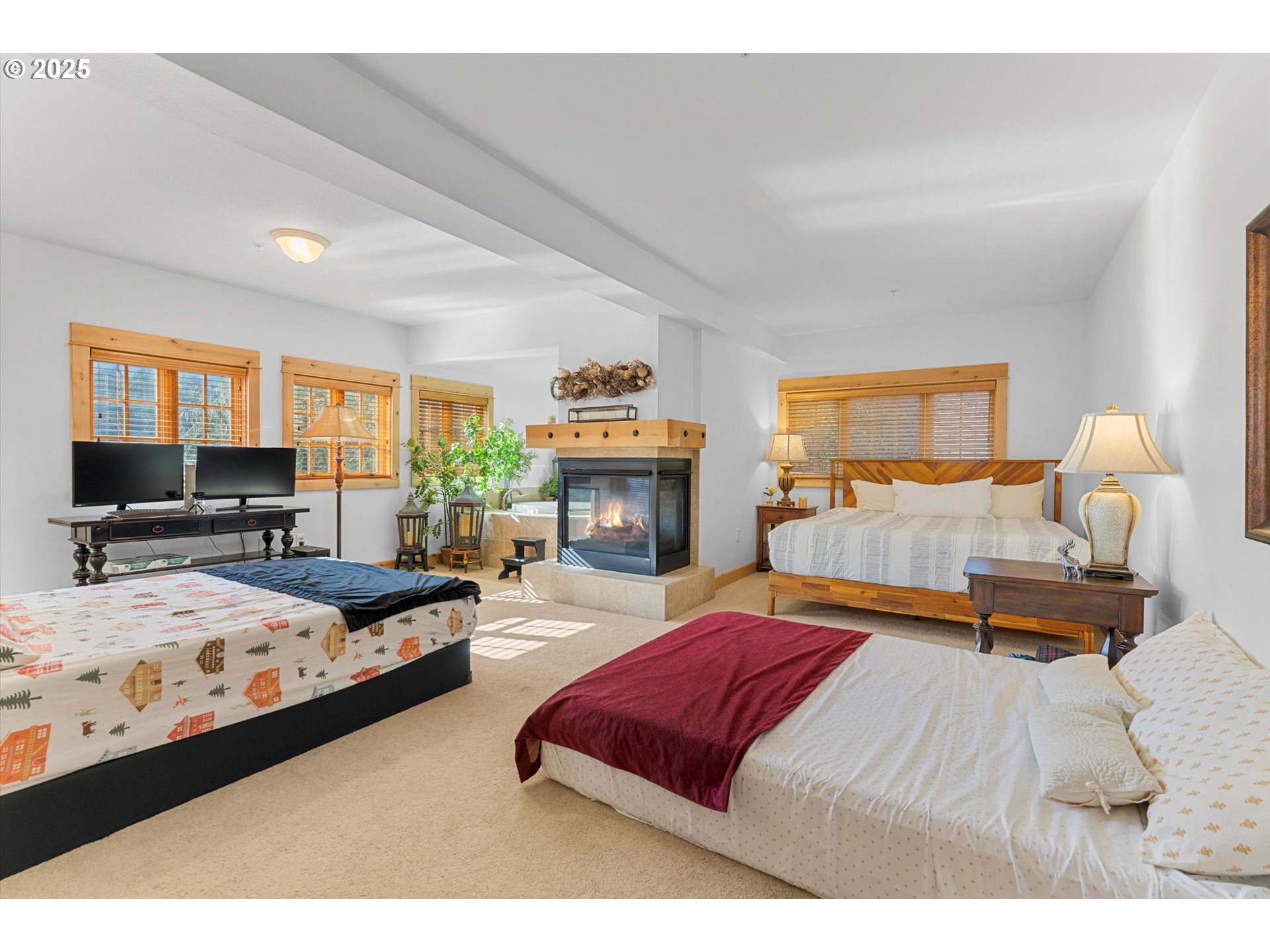 31200 East Collins Lake Road, Unit 1 Government Camp, OR 97028 - Photo 16 of 38 a bedroom with bed and window