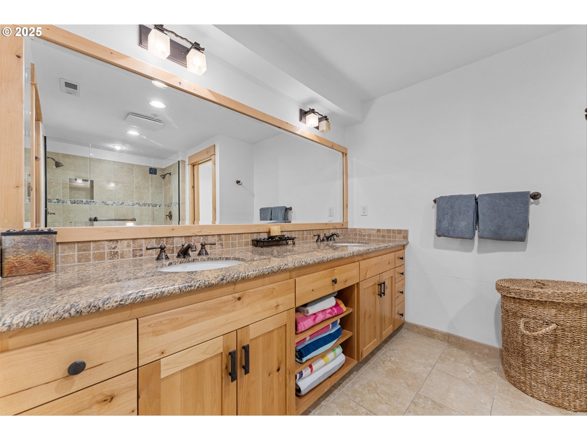 31200 East Collins Lake Road, Unit 1 Government Camp, OR 97028 - Photo 20 of 38 a bathroom with a granite countertop double vanity sink and mirror