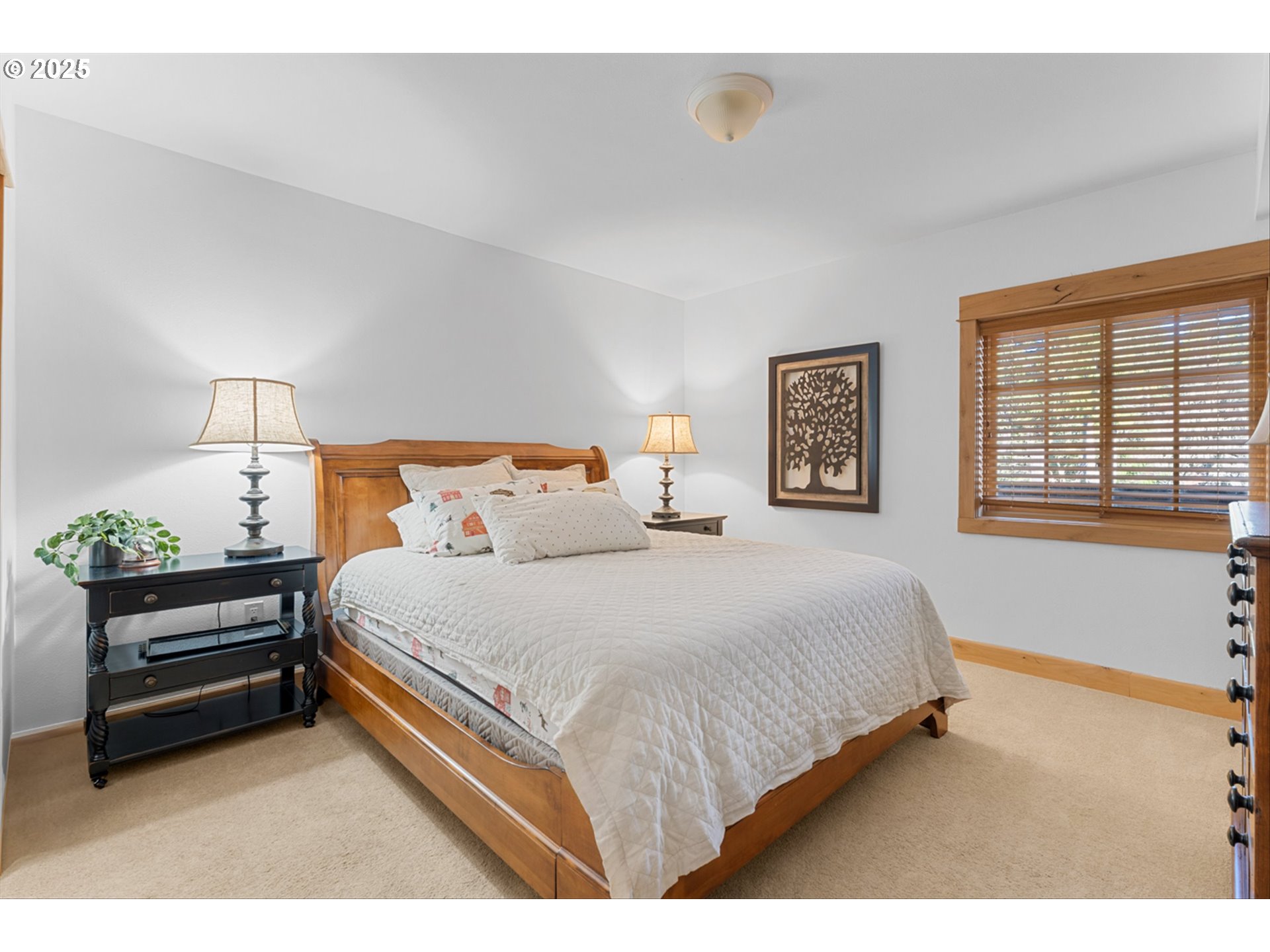 31200 East Collins Lake Road, Unit 1 Government Camp, OR 97028 - Photo 22 of 38 a bedroom with a bed and window